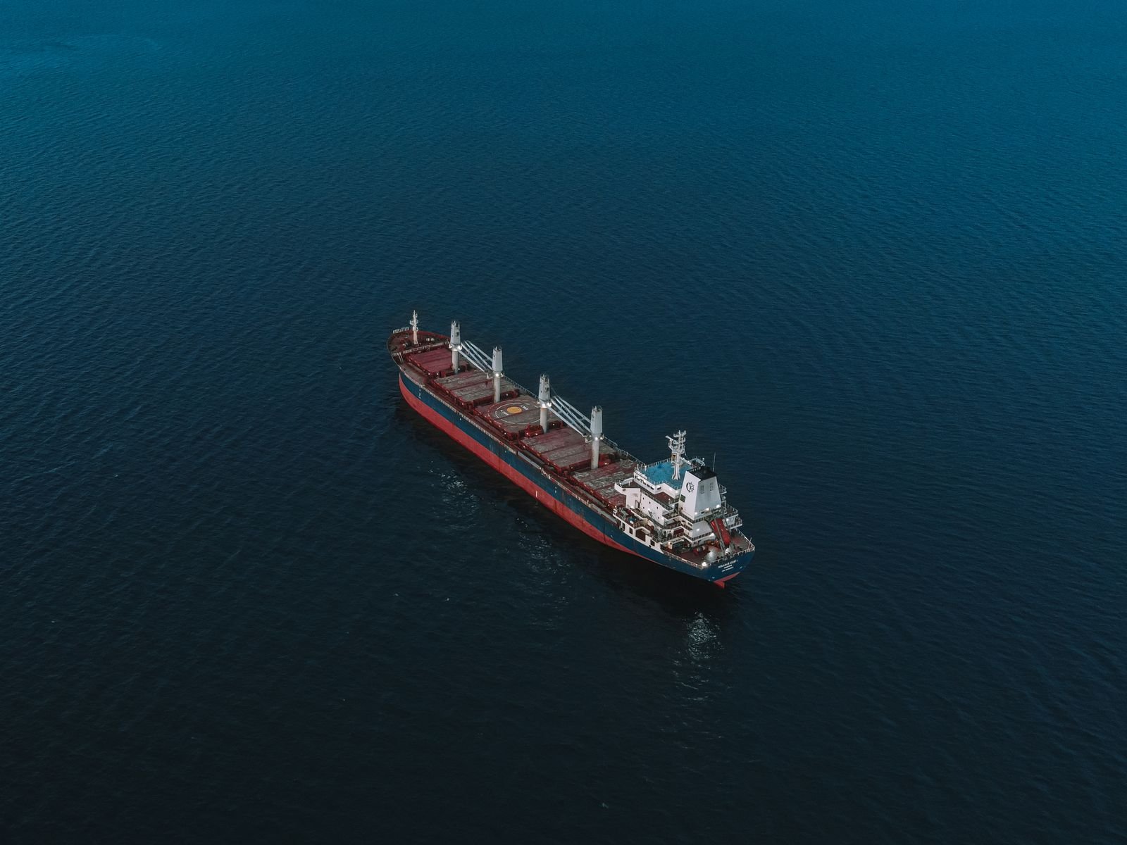 Aerial view of a cargo ship on open sea